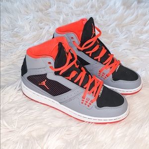 Orange and Black Nike Jordan’s (Boys)